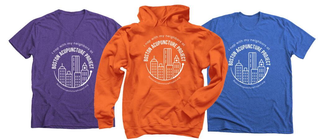 purple v-neck t-shirt, orange pullover hoodie, and blue unisex t-shirt that say I nap with my neighbors at Boston Acupuncture Project